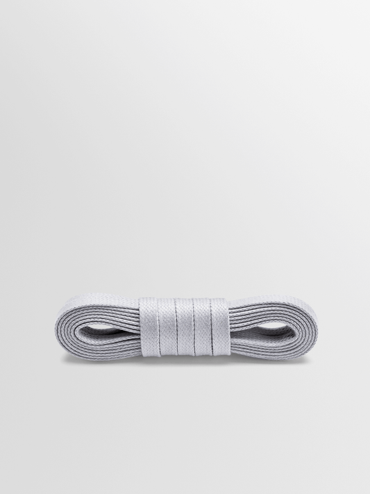 Pebble-colored first shoelace